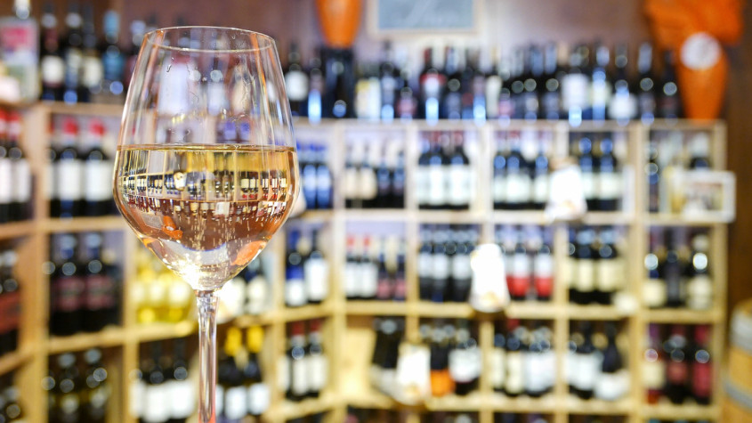 White wine glass in an Italian wine bar.